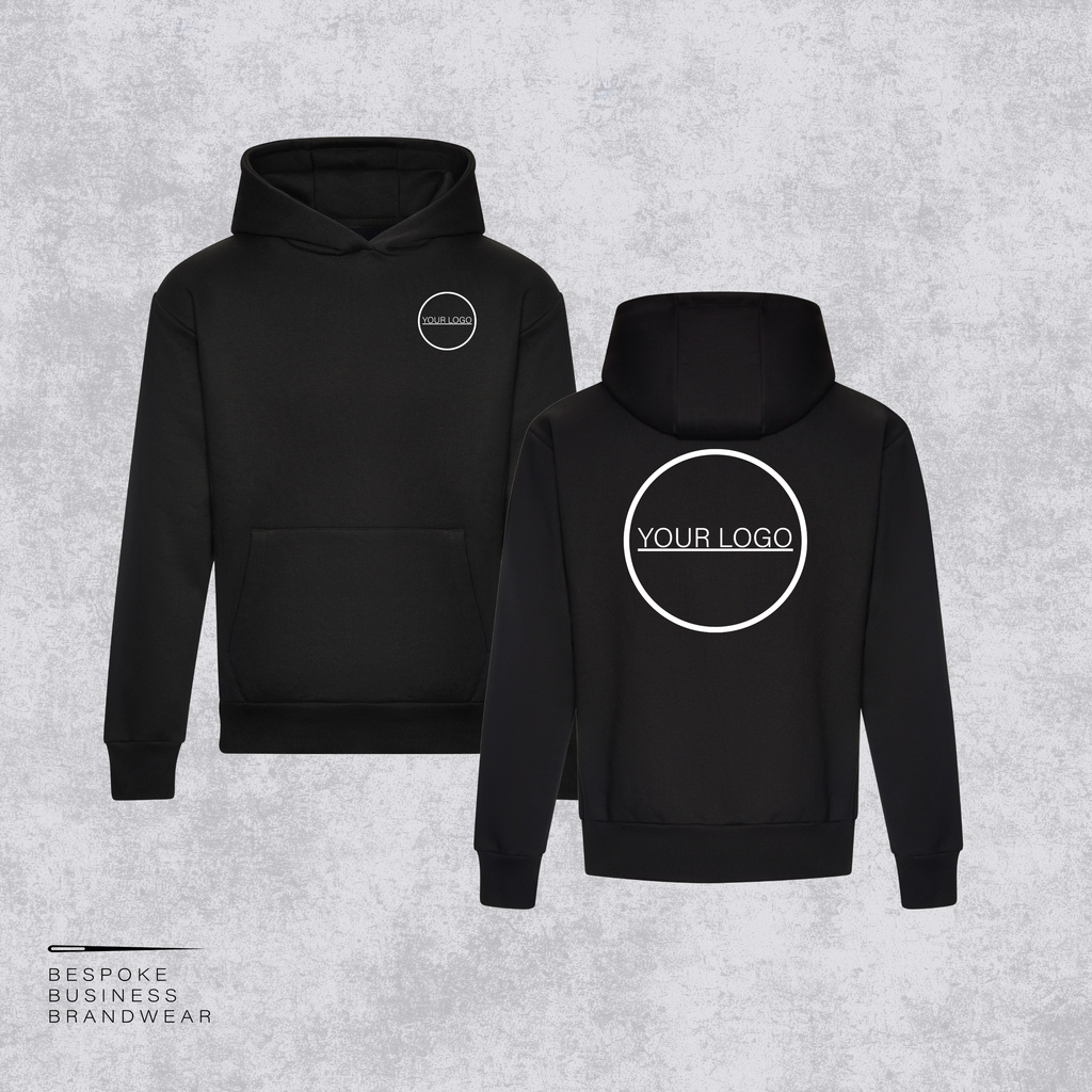 Two black custom-printable hoodies shown from the front and back on a textured gray background. The front hoodie features a small circular logo placeholder on the left chest, and the back hoodie features a larger circular logo placeholder with the text 'YOUR LOGO'.